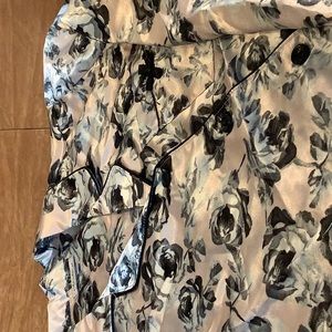 Size small women’s pajamas. Rose pattern with pale pink background. NWT